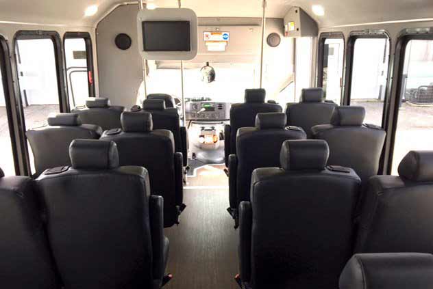Leather seats inside a Windstar Bus