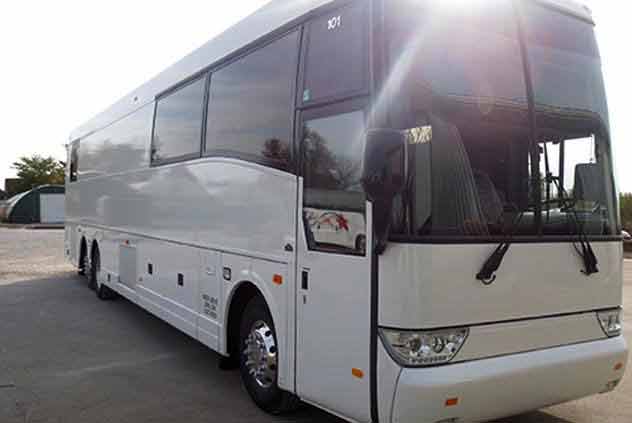 VIP Motorcoach Driving Down Road